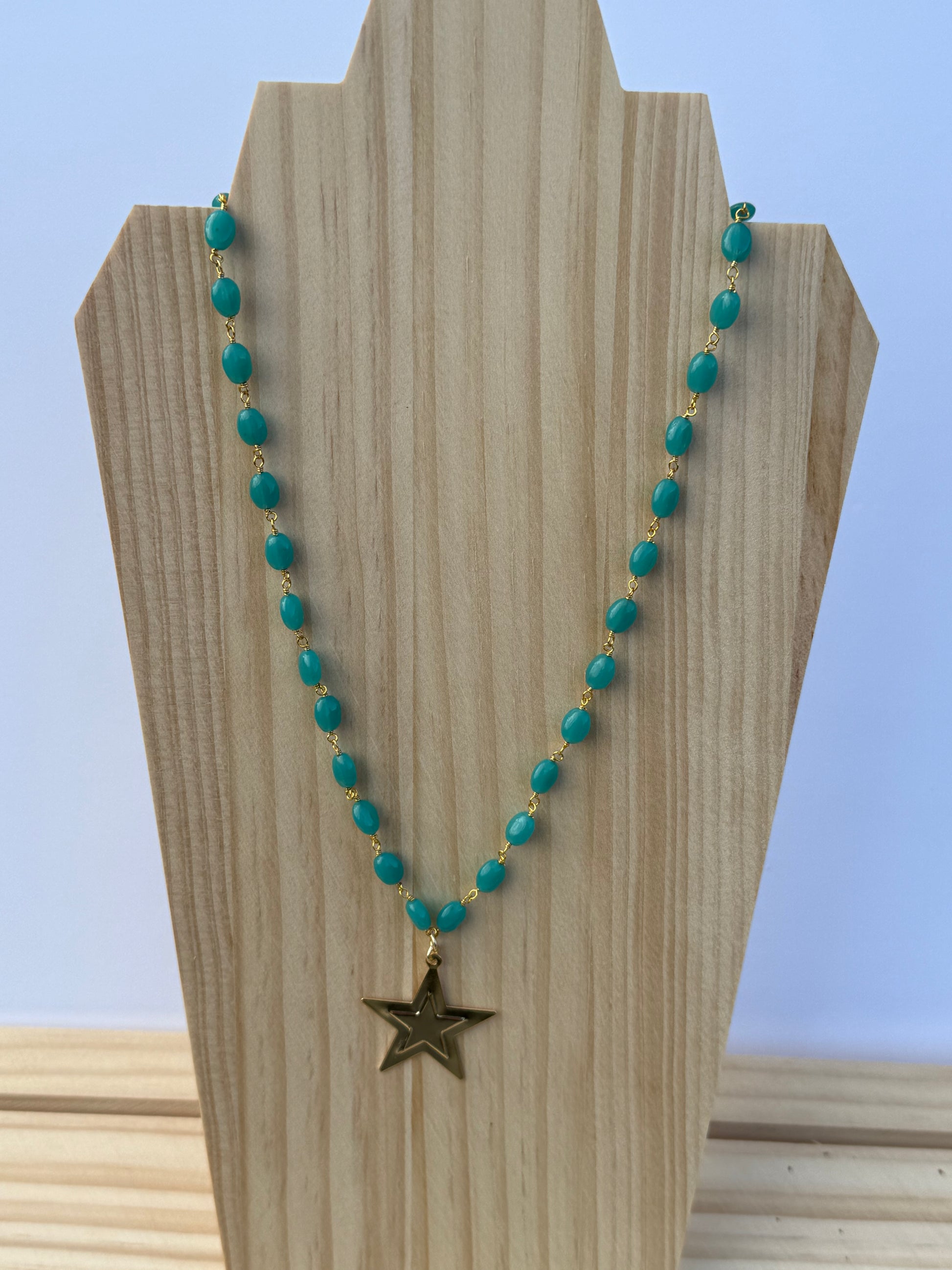 Long teal star stacker