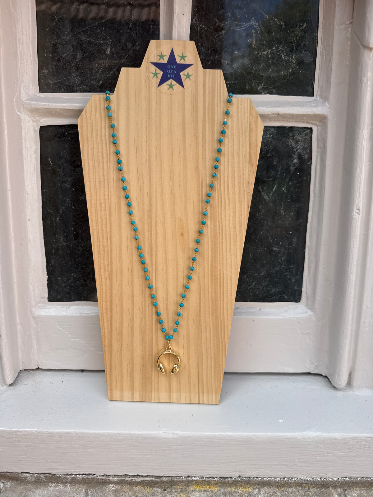 Long turquoise headphone necklace