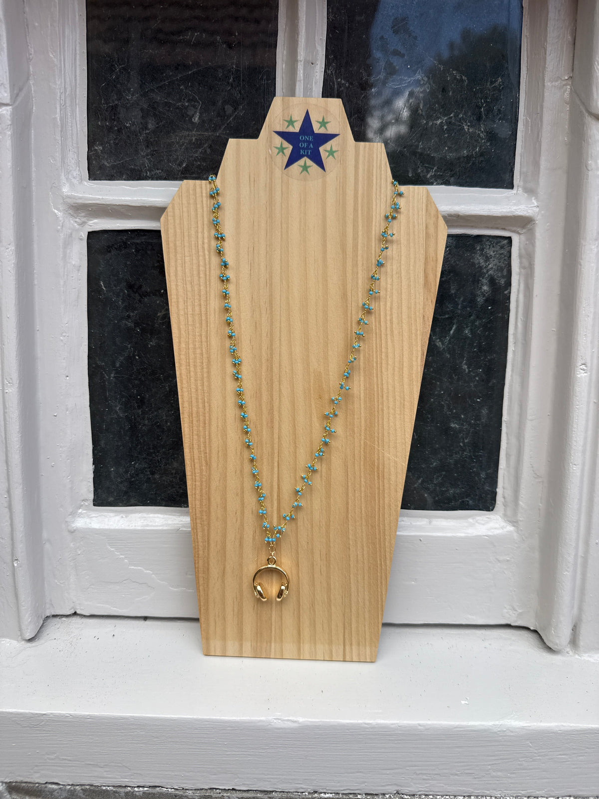 Long turquoise headphone necklace