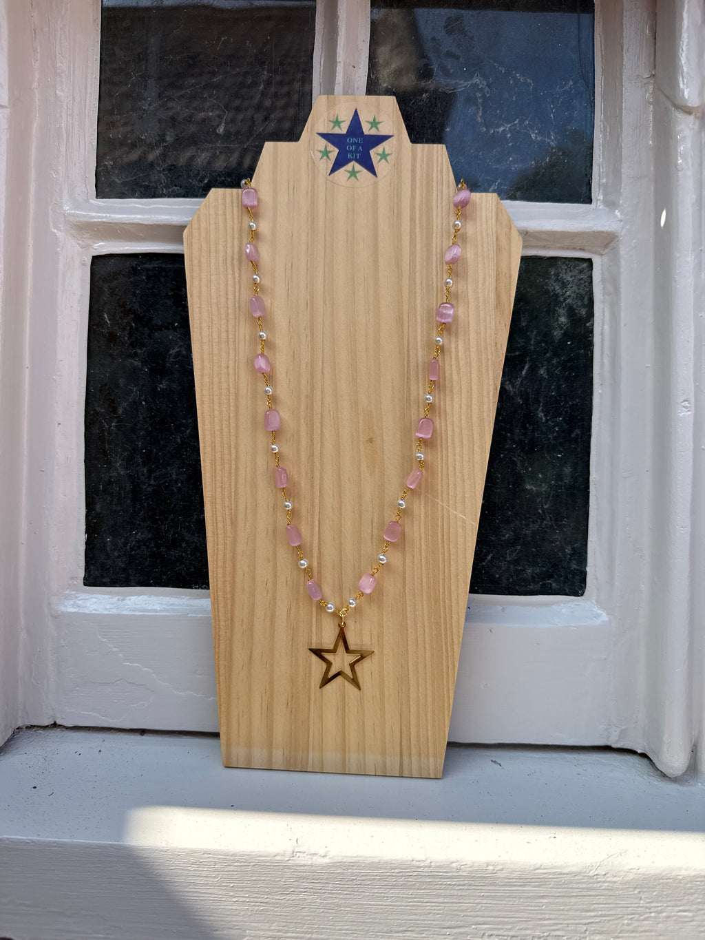 Pink and pearl long star necklace