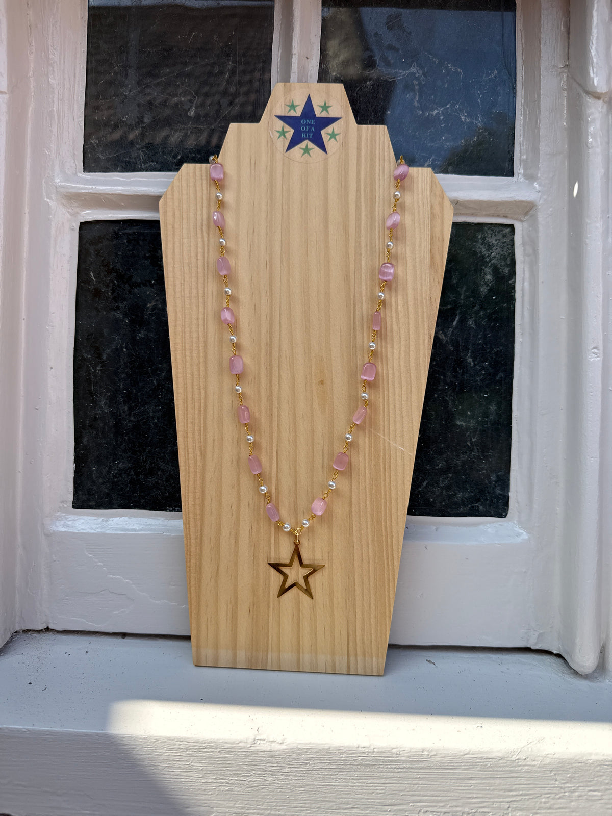 Pink and pearl long star necklace