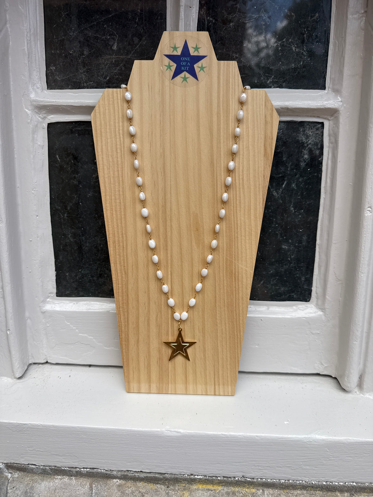 Long white star necklace