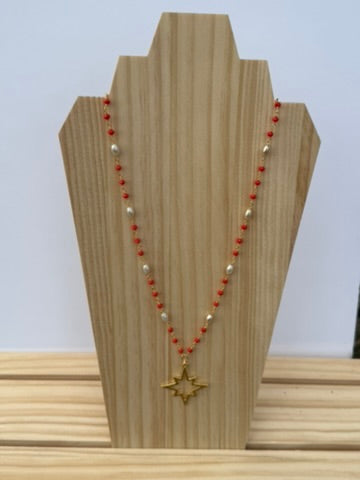 Red and pearl long star necklace