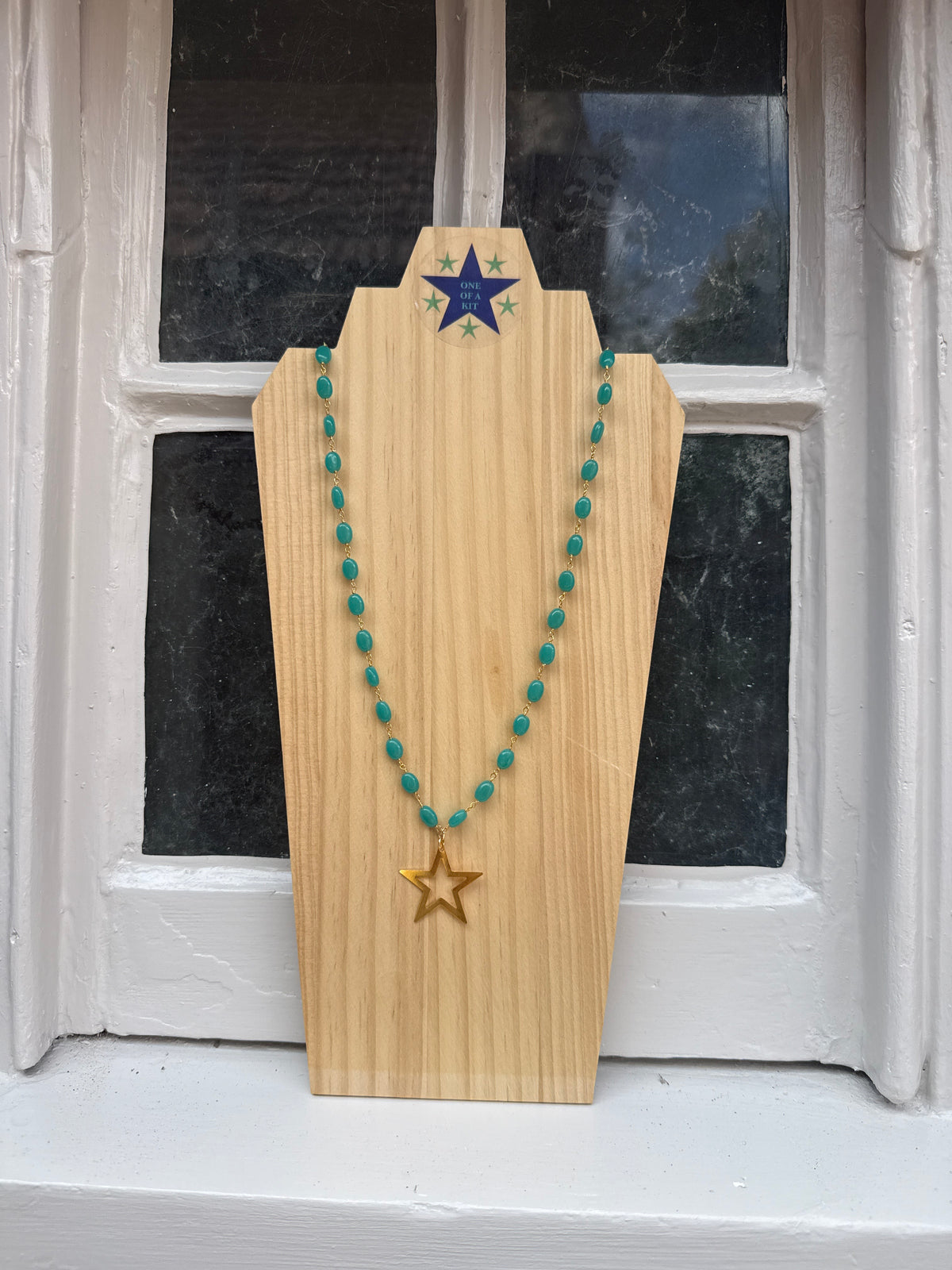 Teal long star necklace